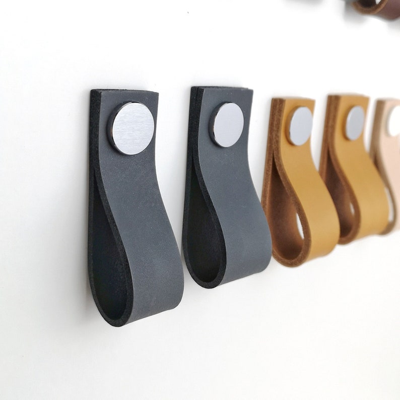 A wide variety of high-quality handmade Leather drawer pulls and leather cabinet pulls to upgrade your furniture pieces to which you want to give a new look. The leather pulls are Made in Germany by Rowzec Design using the finest materials.