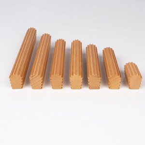 Side view of beech wood cabinet handle showing thickness ribbed design and smooth finish