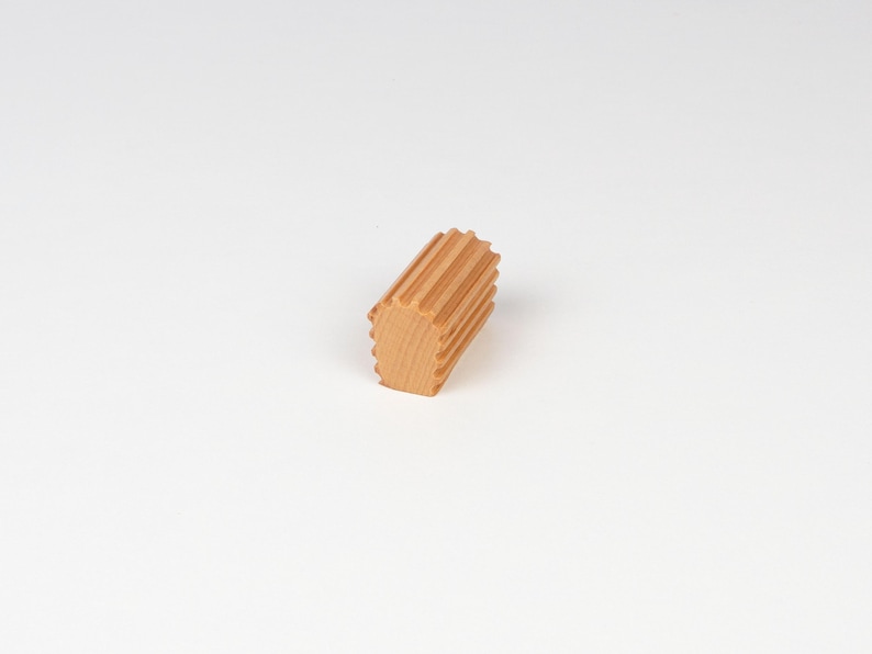 Side view of beech wood cabinet handle showing thickness ribbed design and smooth finish