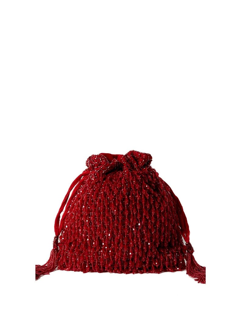 May include: A red beaded drawstring bag with a tassel on each side.
