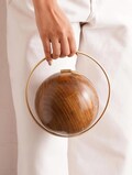 Wooden Ball Clutch: Handcrafted Wooden Evening Bag with Brass Handle product logo