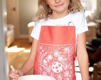 Olivia Ladybird Child's Apron in red, Scandi style gift for cookery fun with the kids