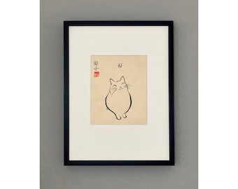 May include: A black framed print of a simple line drawing of a cat with the Japanese characters "猫" and "福" in the top right corner.