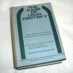 May include: A vintage book titled "The Case of Leon Trotsky" with a light blue cover and dark green accents. The book includes text about the Moscow Trials and the Dewey Commission.