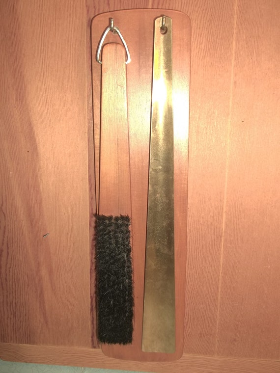 Vintage Echt Nussbaum shoehorn and brush hanging s