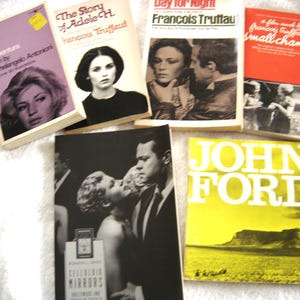 May include: A collection of vintage paperback books with titles including "The Story of Adele H", "Day for Night", "Avventura", "Small Change", and "John Ford".