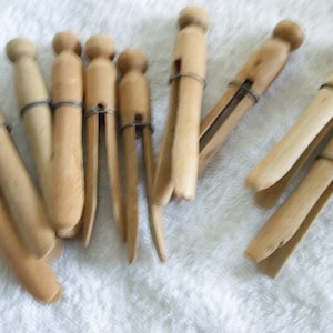 Vintage wood with wire push on clothes pins