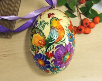 Ukrainian Easter eggs made of wood and hand painted in Petrykivka painting, easter eggs decorations, easter eggs ornaments, traditional eggs