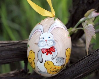 Creative Easter eggs painted Easter rabbit with chickens  ornament, traditional handmade Easter decorations with Petrykivka painting