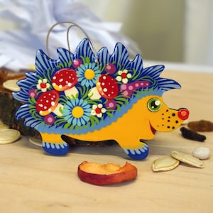 Hedgehog Christmas animal ornaments handmade of wood and hand painted in ukrainian Petrykivka style image 1