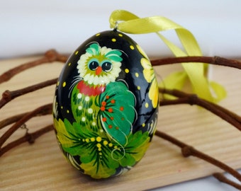 Hand painted Ukrainian Easter eggs Pysanka with traditional Petrykivka painting - handcrafted Ukrainian egg with owl and flowers patterns