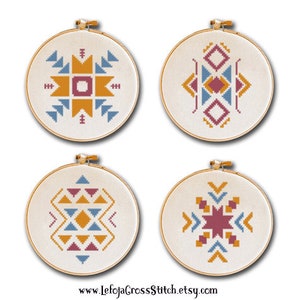 May include: Four embroidery hoop patterns with geometric designs in shades of blue, yellow, red, and white. The patterns are in a modern style and would be perfect for a home decor project.
