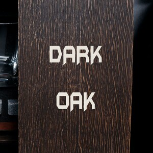 May include: A dark brown wooden box with the words "DARK OAK" printed in white on the front.