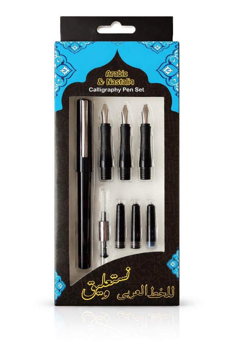 May include: A calligraphy pen set in a box. The box is black with a blue and white design. The set includes a black pen, several nibs, and ink cartridges. The text on the box reads "Arabic & Nastaliq Calligraphy Pen Set."