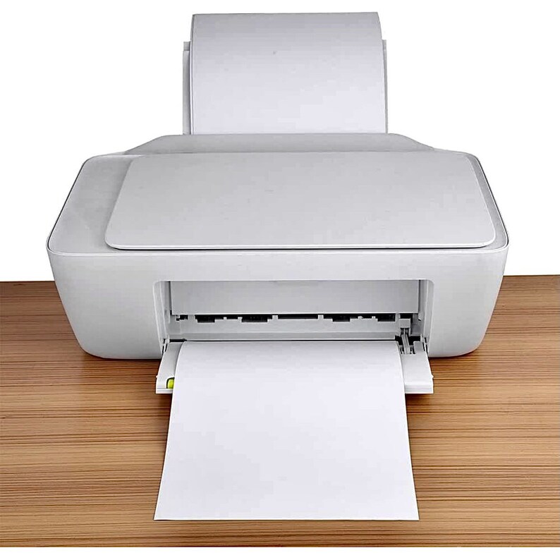 May include: A white inkjet printer with a sheet of paper feeding through the output tray.
