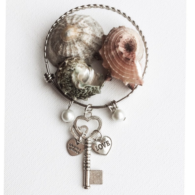 Key charm and double love heart silver bangle bracelet with pearls and adjustable with a twisted bangle design gift for her
