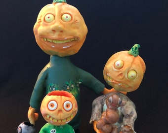 Pumkin Dad & Kids Bobble Head Candy Containers