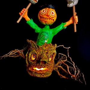 Pumpkin kid nodder in spooky tree lantern