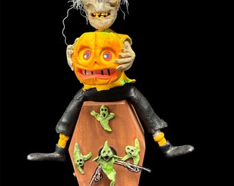 Bobblehead Skeleton on coffin  clock with lantern candy container