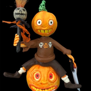 Kürbisknabe auf Jack O Lantern Candy-Container