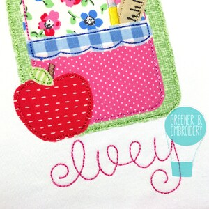 May include: A white fabric with a pink and green applique of a school bag with a red apple and the word "elvey" embroidered in pink thread. The text "Greener B. Embroidery" is in a blue balloon shape.
