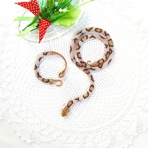 Ouroboros Gouden ketting vorm slang Glanzende kraal Gehaakte sieraden set Armband ketting flexibel touw Lasso kraal IJzeren slang armband ketting
