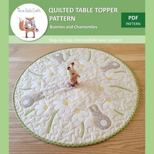 May include: A quilted table topper pattern featuring bunnies and daisies. The pattern is a step-by-step intermediate level pattern and is available as a PDF download.