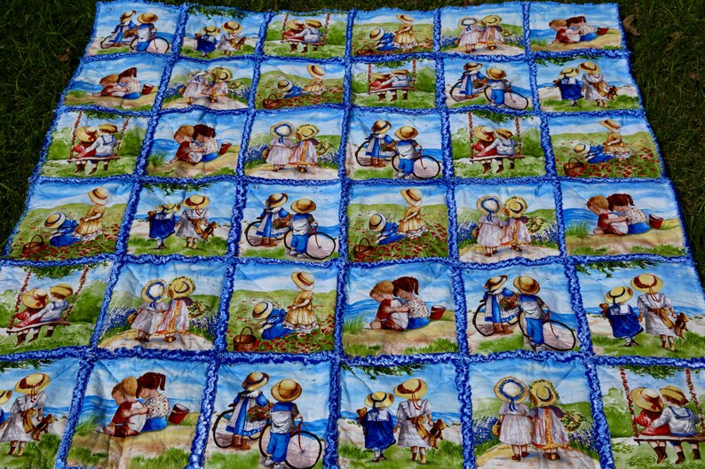 Blue rag quilt 55x55 lap size quilt Children near the ocean playing