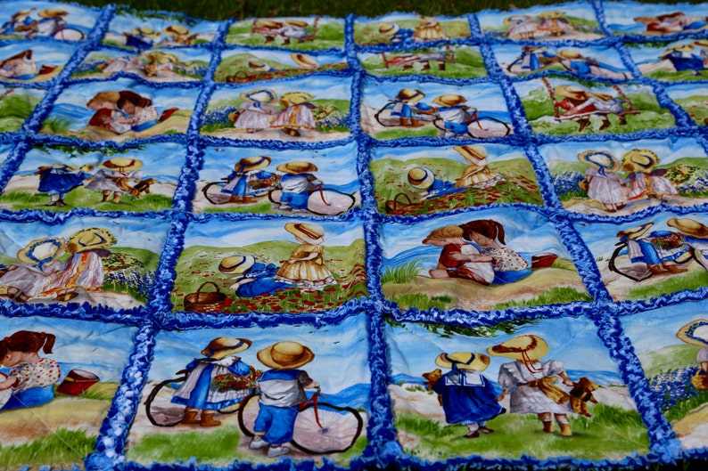 Blue rag quilt 55x55 lap size quilt Children near the ocean playing