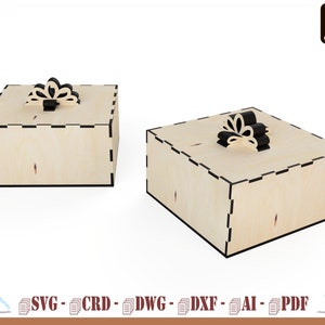 May include: Two wooden boxes with intricate cut-out designs on the lids. The boxes are made of light wood and have a black border. The lids are open and show the interior of the boxes.