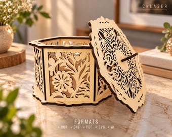 May include: A light-colored wooden hexagonal box with intricate laser-cut floral patterns on the sides and a matching lid. The text CNLASER appears in the top right corner, and the text FORMATS CDR DXF PDF SVG AI appears at the bottom.