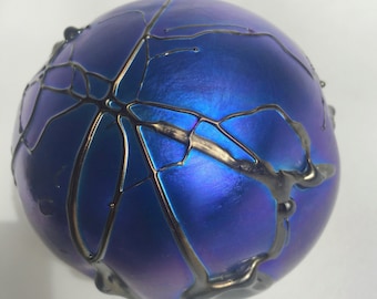 ROLLIN KARG Art Glass Paperweight Iridescent Blue with Black Trailed Glass