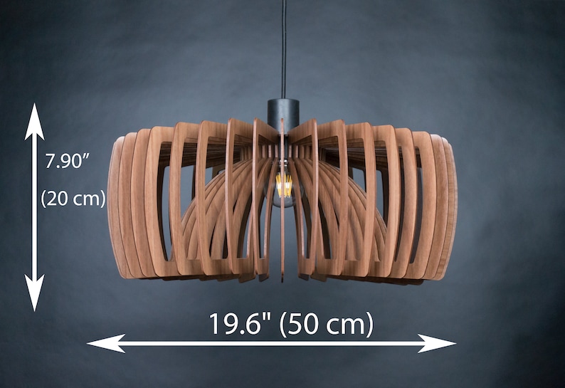 May include: A wooden pendant light fixture with a geometric design. The light is 19.6 inches wide and 7.9 inches tall.