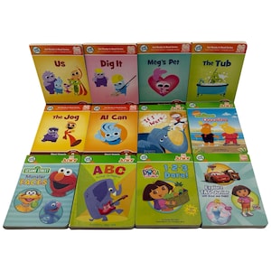 Puede incluir: Una colección de libros infantiles con cubiertas coloridas. Los títulos incluyen "Us", "Dig It", "Meg's Pet" y "The Tub". Los libros presentan personajes de dibujos animados y están diseñados para los primeros lectores. Los libros están dispuestos en filas.