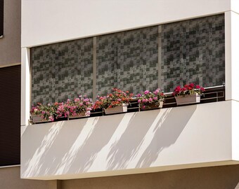 May include: A white building with a balcony featuring a row of potted pink and red flowers. The balcony has a white railing and a window with a patterned film.