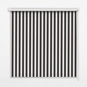 May include: Black and white striped window blind with a white pull cord.