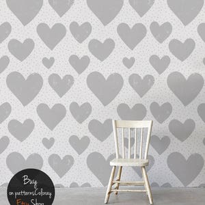 May include: A white wooden chair sits in front of a wall with a gray heart pattern and small pink dots. The text "Buy on patternsColoray Etsy Shop" is on a black circle.
