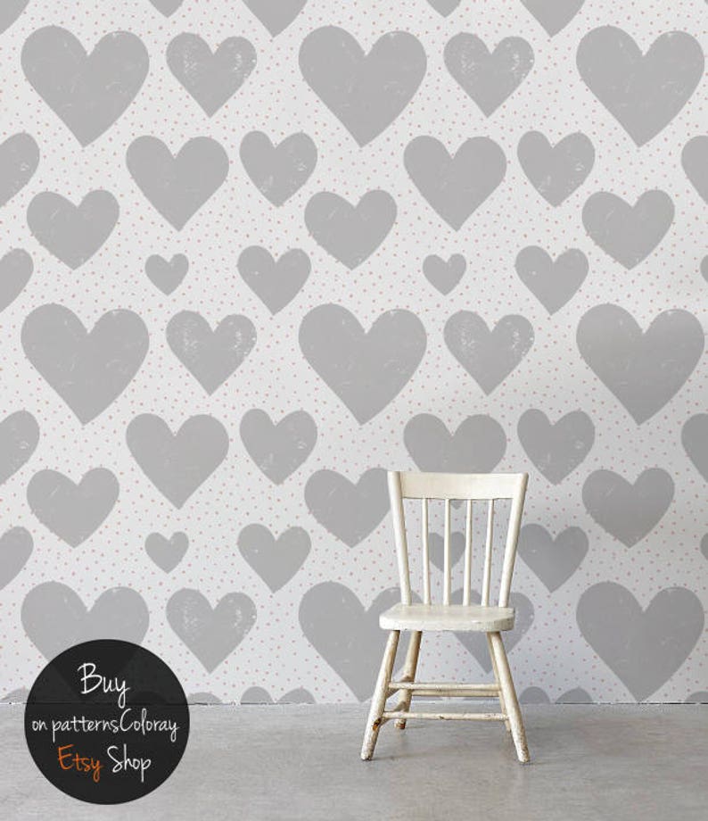 May include: A white wooden chair sits in front of a wall with a gray heart pattern and small pink dots. The text "Buy on patternsColoray Etsy Shop" is on a black circle.