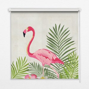 May include: A pink flamingo stands in a tropical setting with lush green palm leaves and pink flowers.