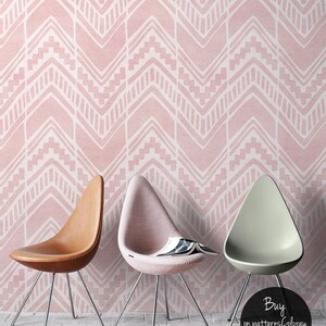 May include: Three chairs with different colored upholstery in front of a pink and white chevron patterned wallpaper. The chairs have a teardrop shape and are on silver legs. The text "Buy on patternsColoray Etsy Shop" is at the bottom of the image.