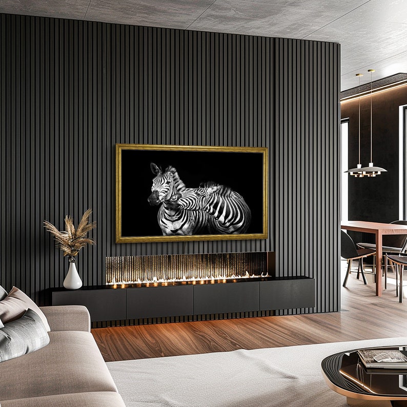 Samsung frame tv mount on black wood slat wall, dark modern living room design