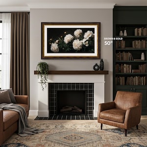 French countryhouse living room with brown leather armchair, black brick fireplace with white brick frame, dark brown wooden mantel, brown and gold tv frame 50 inch, green contemporary bookshelf