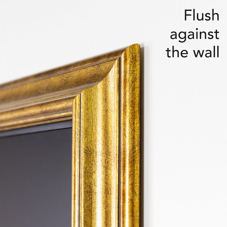 Gold tv frame leaves no gaps from the Wall.