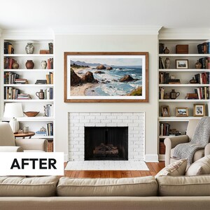white american living room with a fireplace and beige u shaped sofa, bult in white bookshelves on both of fireplace sides, natural stained wooden frame with abstract landscape ocean tv art