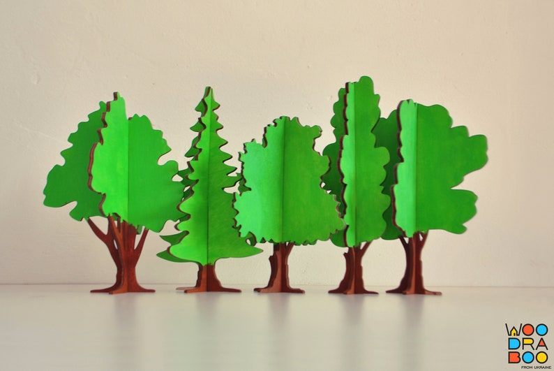 Ensemble de 10 arbres de Noël décoratifs en bois fabriqués à la main, motif vectoriel prêt pour CNC Modèle pour support d'ornement d'arbres de puzzle 3D découpé au laser image 3