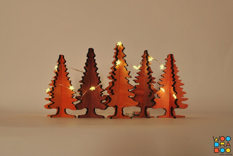 Ensemble de 10 arbres de Noël décoratifs en bois fabriqués à la main, motif vectoriel prêt pour CNC Modèle pour support d'ornement d'arbres de puzzle 3D découpé au laser image 2