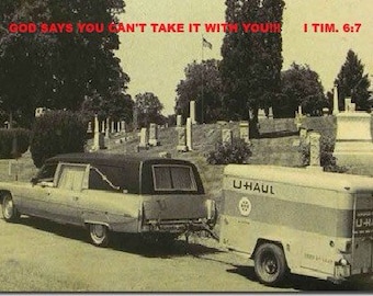 Hearse Pulling U-Haul With Bible Verse