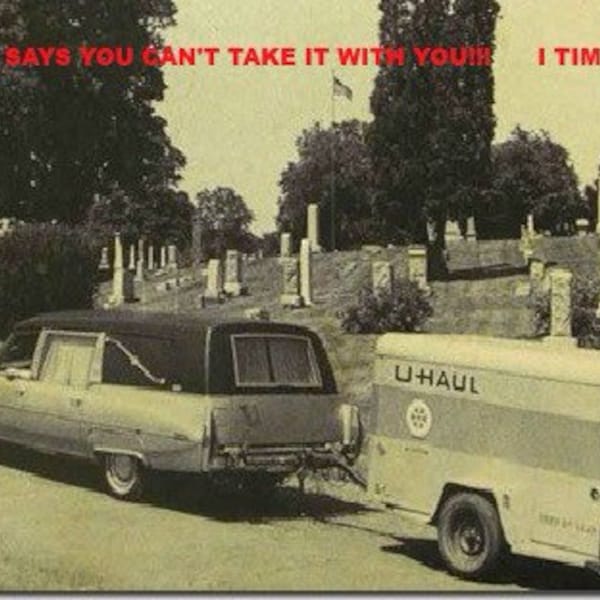 Hearse Pulling U-Haul With Bible Verse