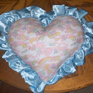 Blue satin ruffle care bear heart-shaped throw pillow