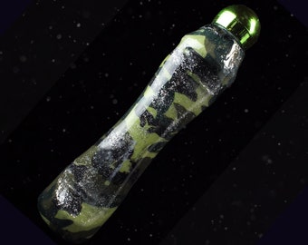 May include: A green and silver glitter camouflage roller bottle with a green lid.